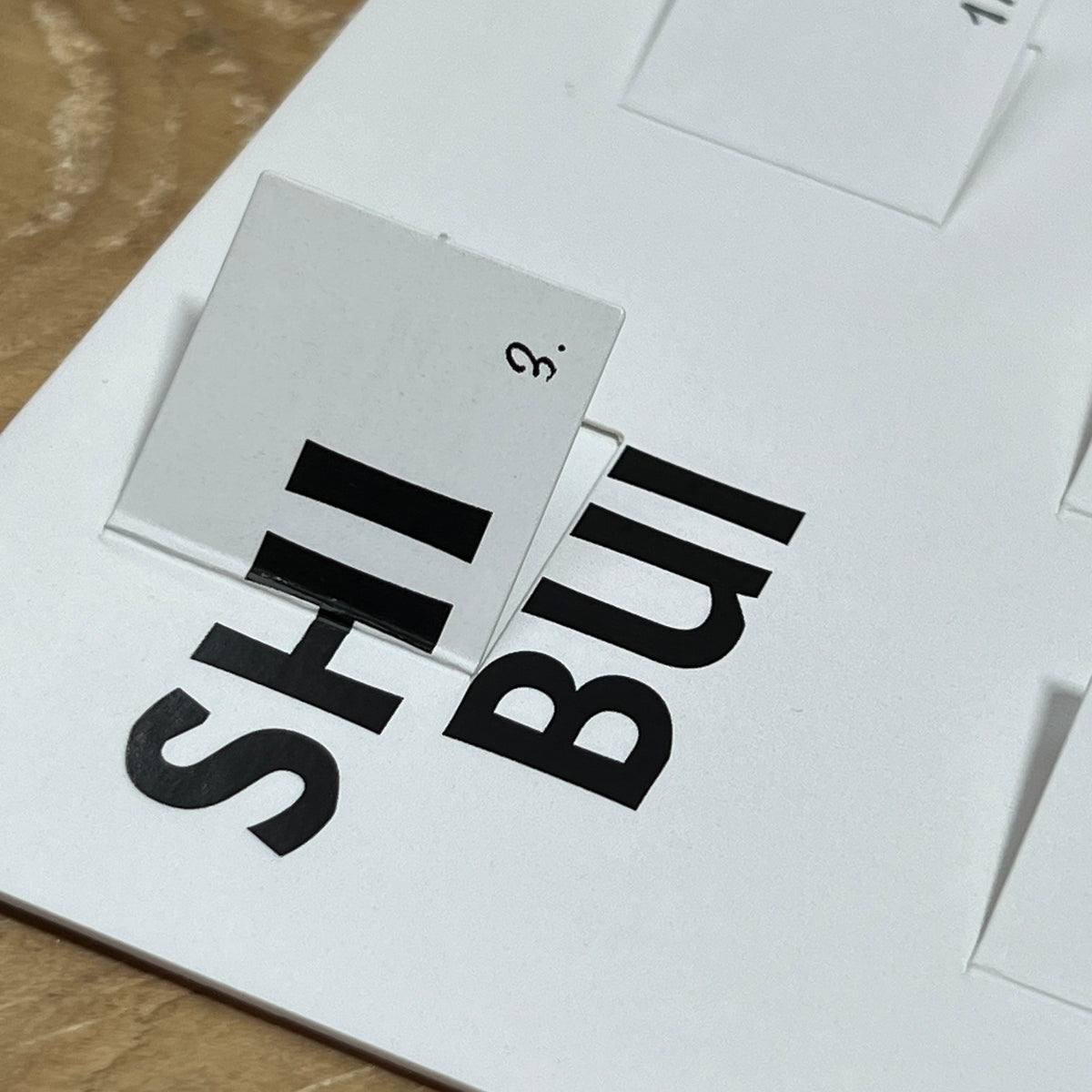 Close-up of an opened door on the Shibui Tea Advent Calendar revealing the brand name underneath