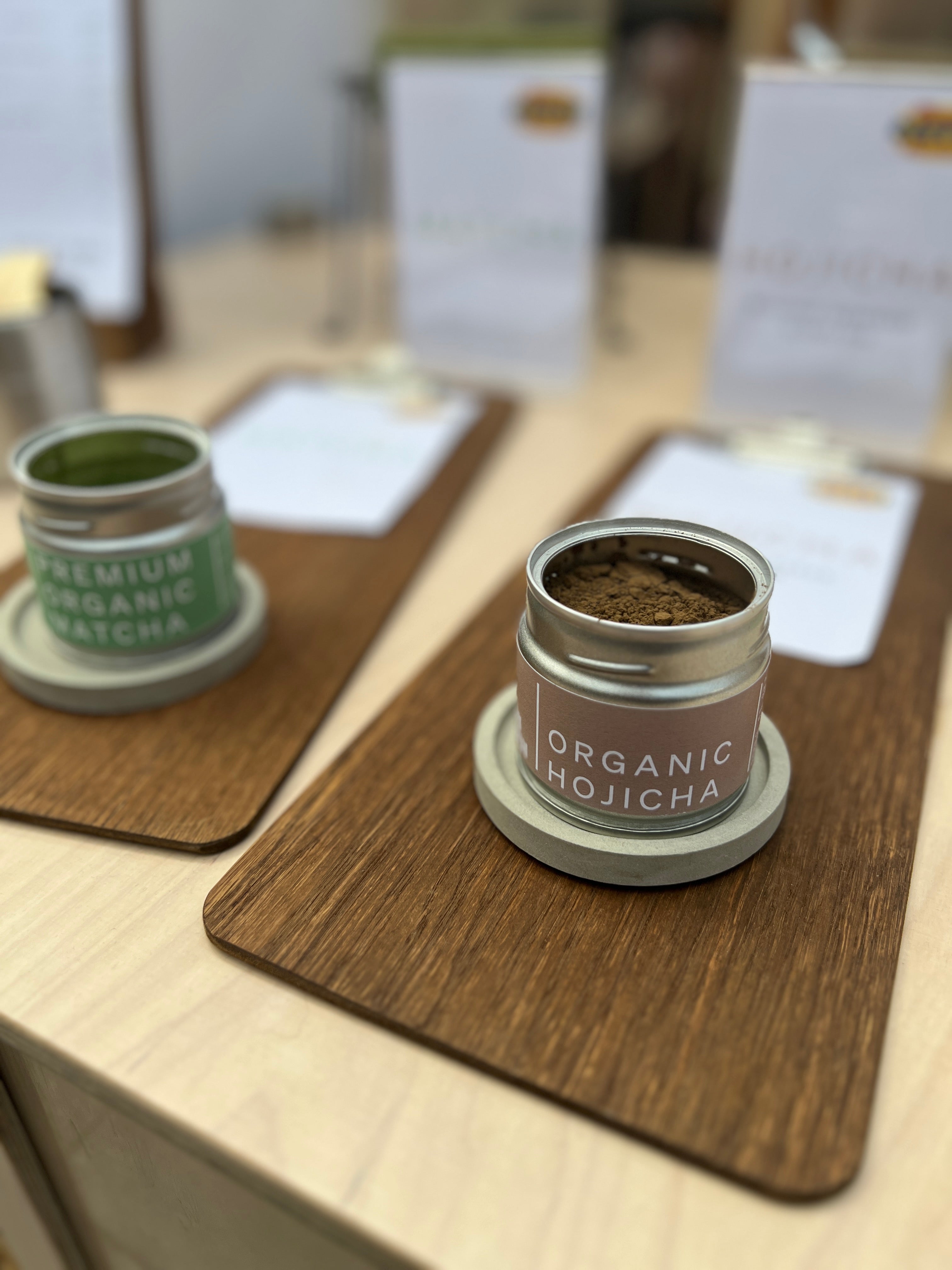 Organic Hojicha and Premium Organic Matcha in tins - display